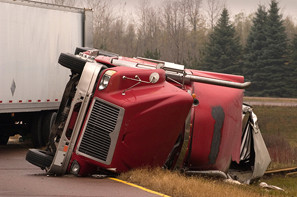 semi truck on it's side after accident