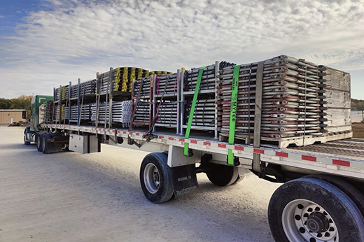 Open deck freight transportation planned around dimensions, loading access, and equipment requirements