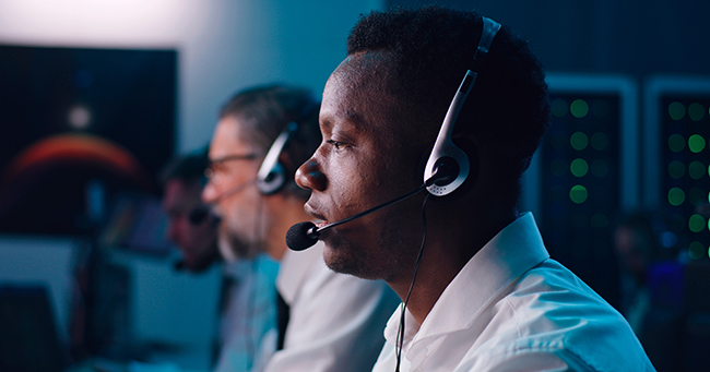 Dispatch broker coordinating freight transportation and trucking carriers.