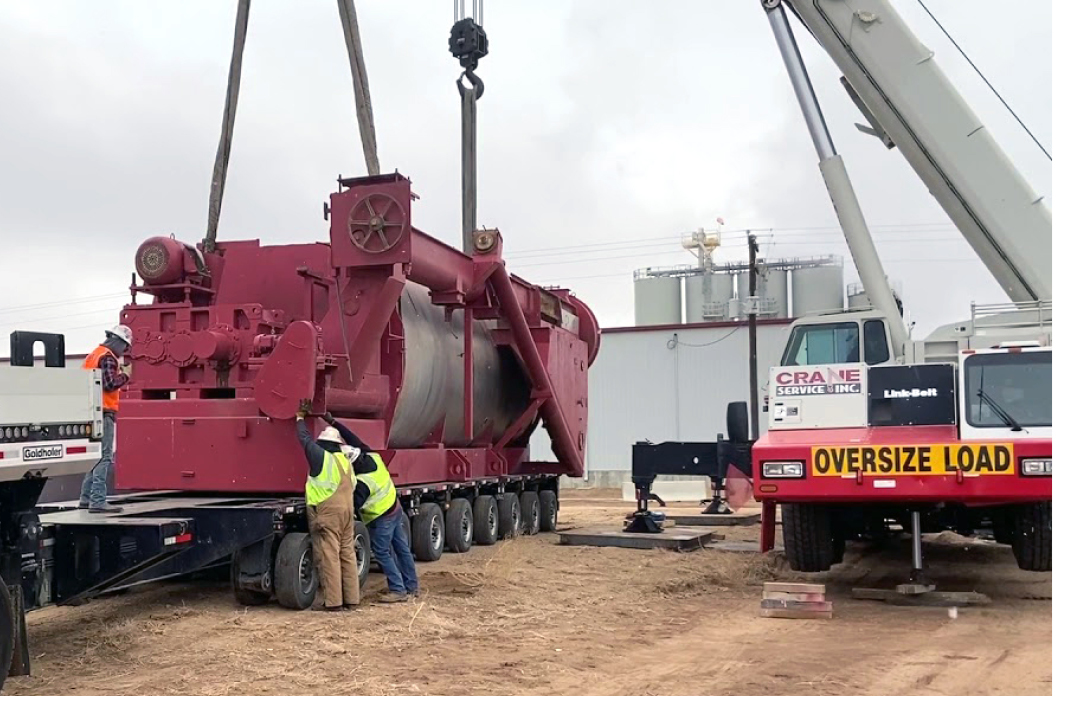 Buchanan utilizes a crane to remove mining equipment to be used on site.