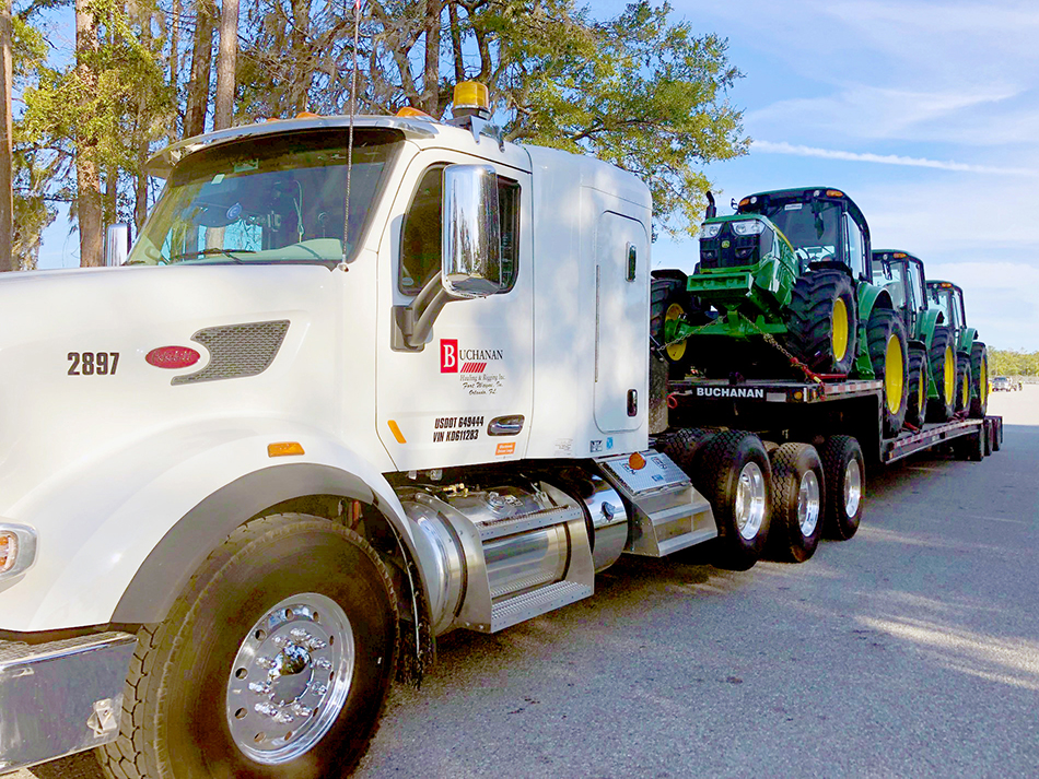Buchanan Logistics transporting agricultural machinery equipment for a retail company. Buchanan Logistics transporting agricultural machinery equipment for a retail company.