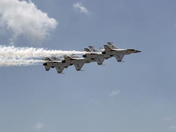 The US Air Force Thunderbirds performing at the 2025 Fort Wayne Air Show with Buchanan employees watching!
