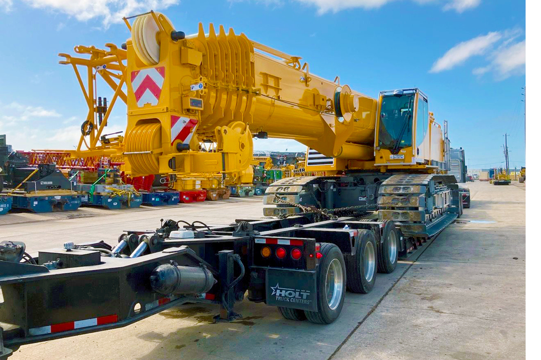 Buchanan Logistics moving a crane with one of their RGN oversized heavy haul trailers.
