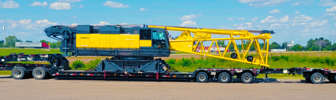 Buchanan Logistics transporting a section of crawler crane to a jobsite for a construction crew.