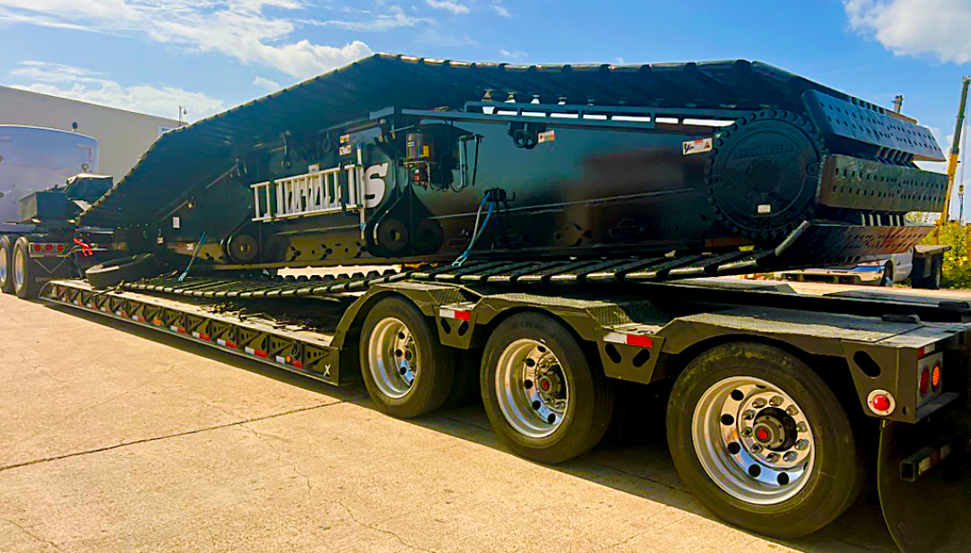 Buchanan Logistics transporting a crawler crane track to a jobsite for a construction crew.