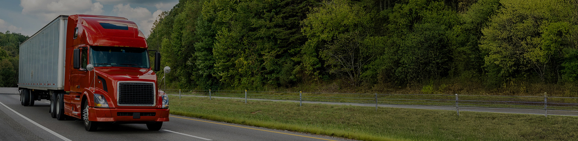 semi-truck driving down highway