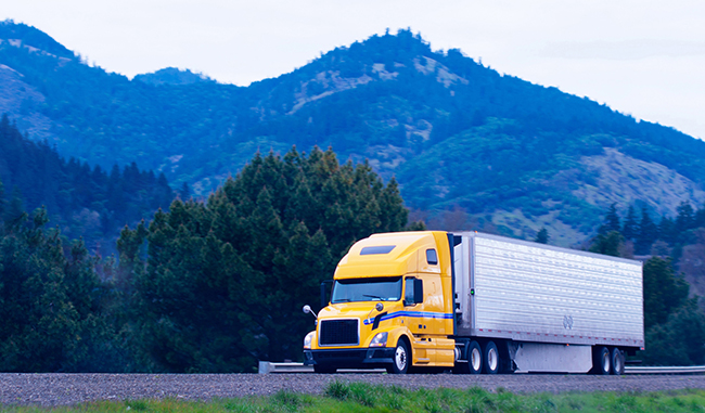 A trucker with his load of freight for Buchanan Logistics traveling North America.