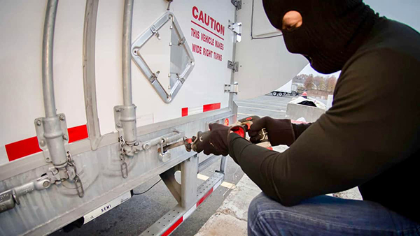 A thief breaking into a trailer causing high insurance claims.