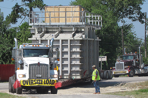 Buchanan employee helps a driver navigate his oversized load