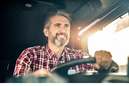 Truck driver who is happy to work for Buchanan.