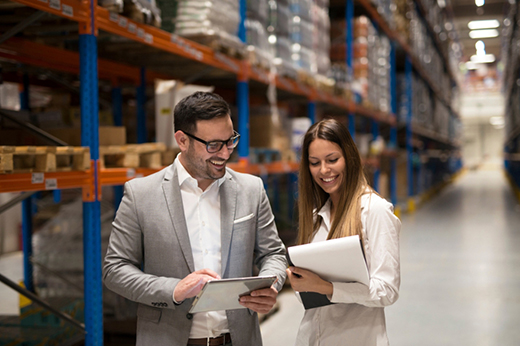 Business professionals coordinating nationwide freight brokerage and logistics services with commercial freight transportation.