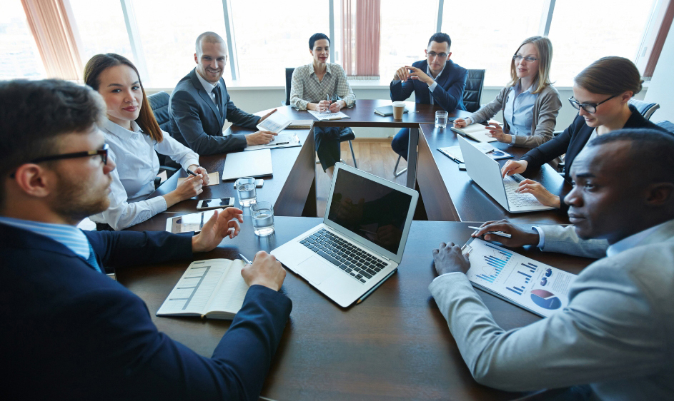 Business professionals meeting with an experienced logistics provider to discuss freight transportation solutions.